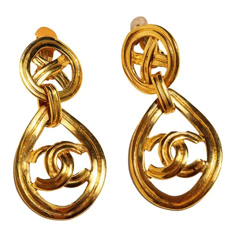 chanel dangle logo earrings|chanel logo stud earrings price.